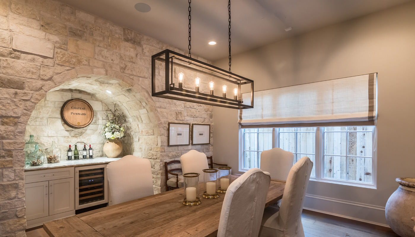 Tuscan style custom stone dining room in Houston, TX.